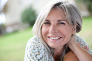 Portrait of serene mature woman in garden